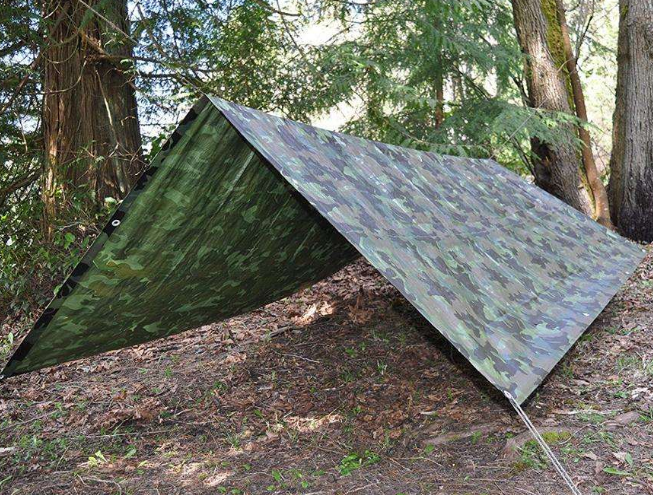 Lona de camuflaje de alta resistencia: protección confiable para exteriores en cualquier aventura.