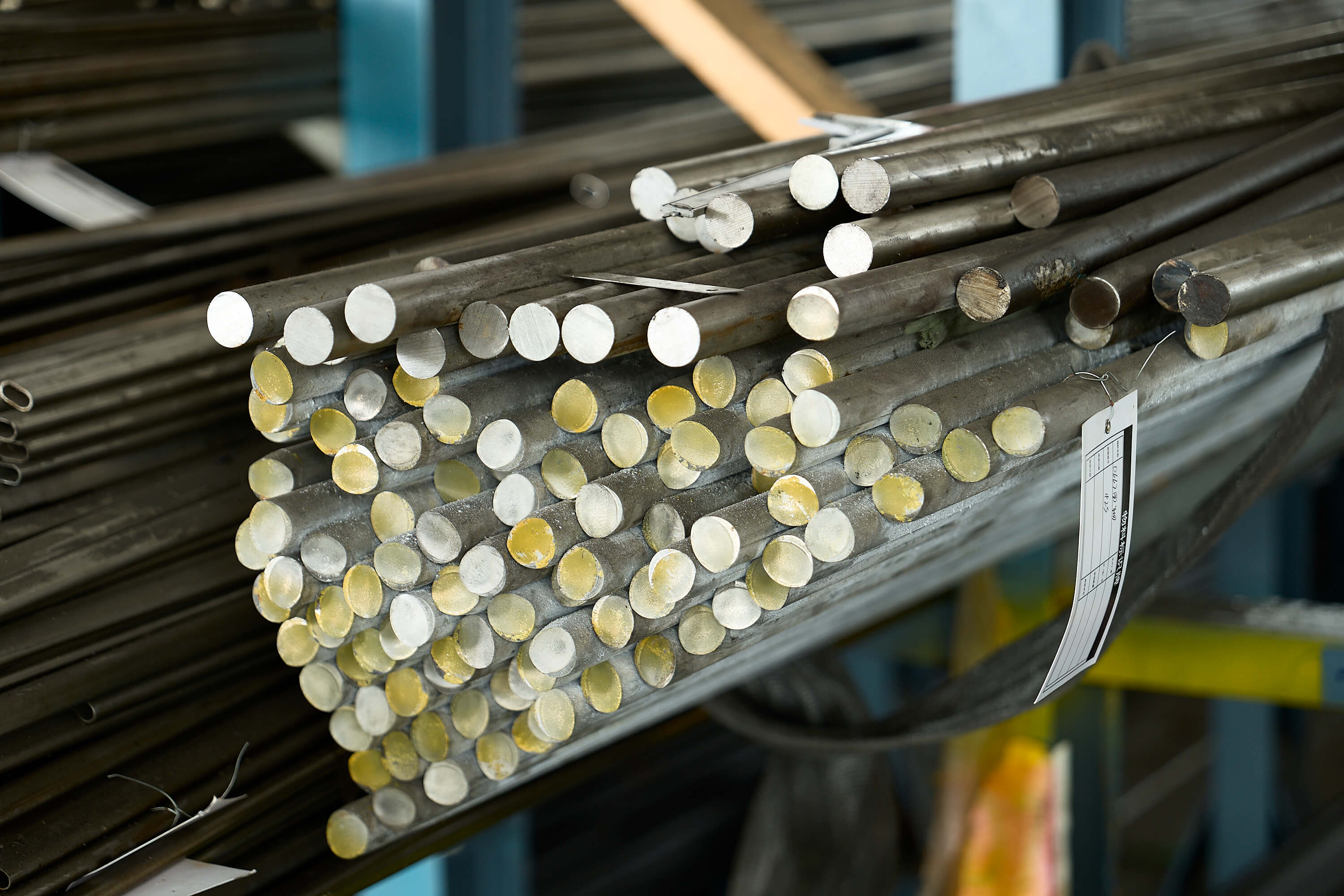 Bulk inventory of 304 stainless steel raw materials for industrial component production.
