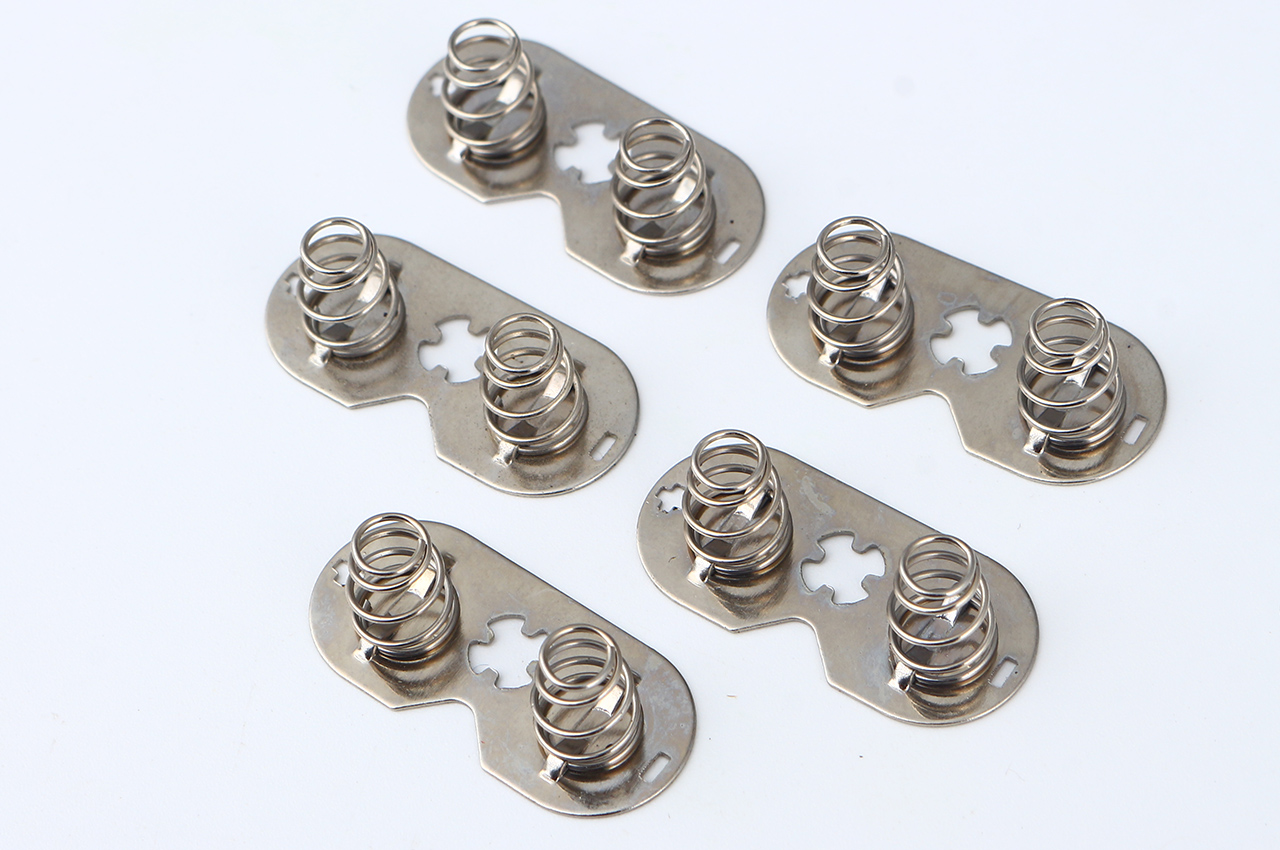 Fully Automated Production of Bridge-Riveted AA Battery Connectors
