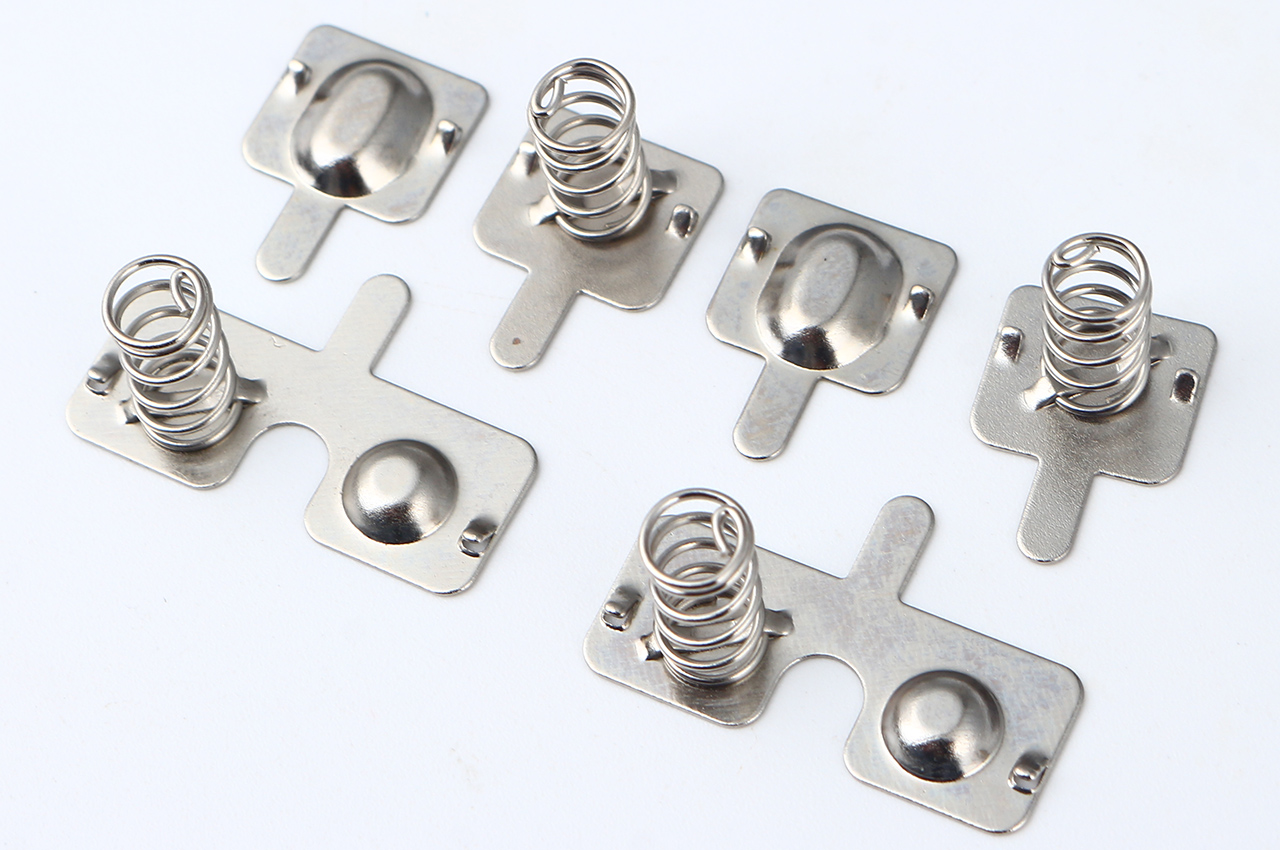 Fully Automated Production of Bridge-Riveted AAA Battery Connectors