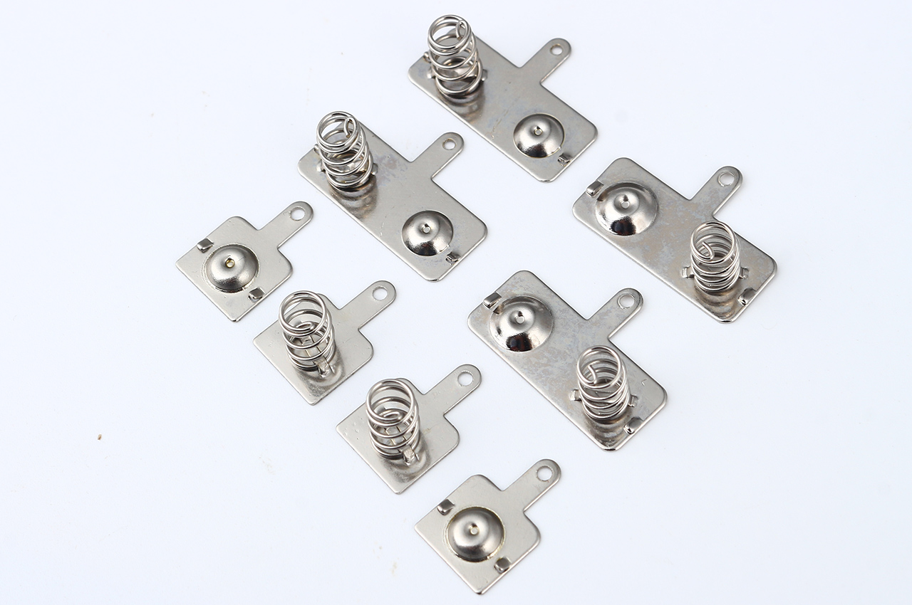 Fully Automated Production of Bridge-Riveted AAA Battery Connectors