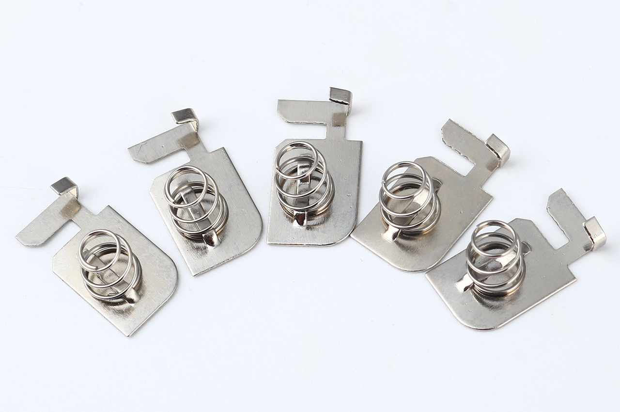 Fully Automated Production of Bridge-Riveted Custom-Shaped AAA Battery Connectors