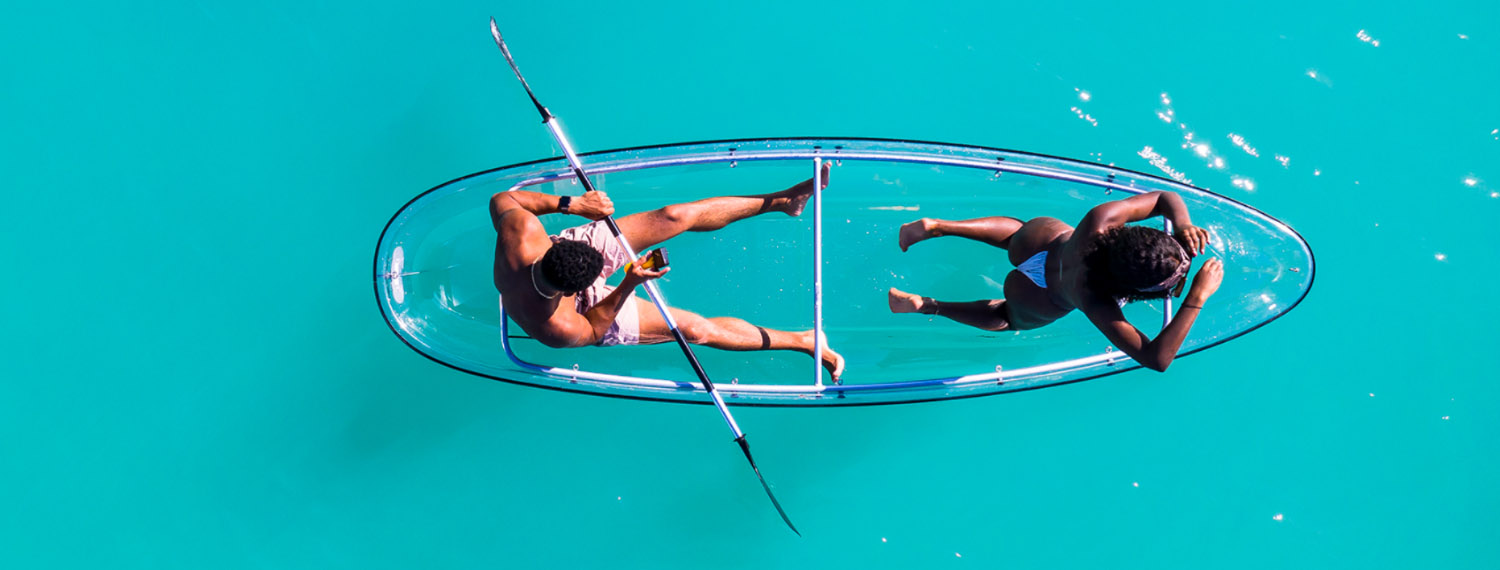A Clear PC Kayak is a type of kayak made from polycarbonate (PC) material, which is known for being extremely durable, lightweight, and transparent