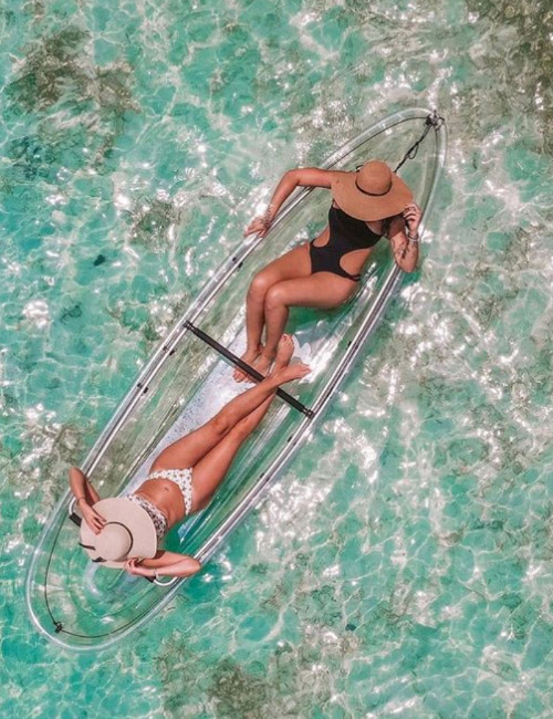 A Clear PC Kayak is a type of kayak made from polycarbonate (PC) material, which is known for being extremely durable, lightweight, and transparent