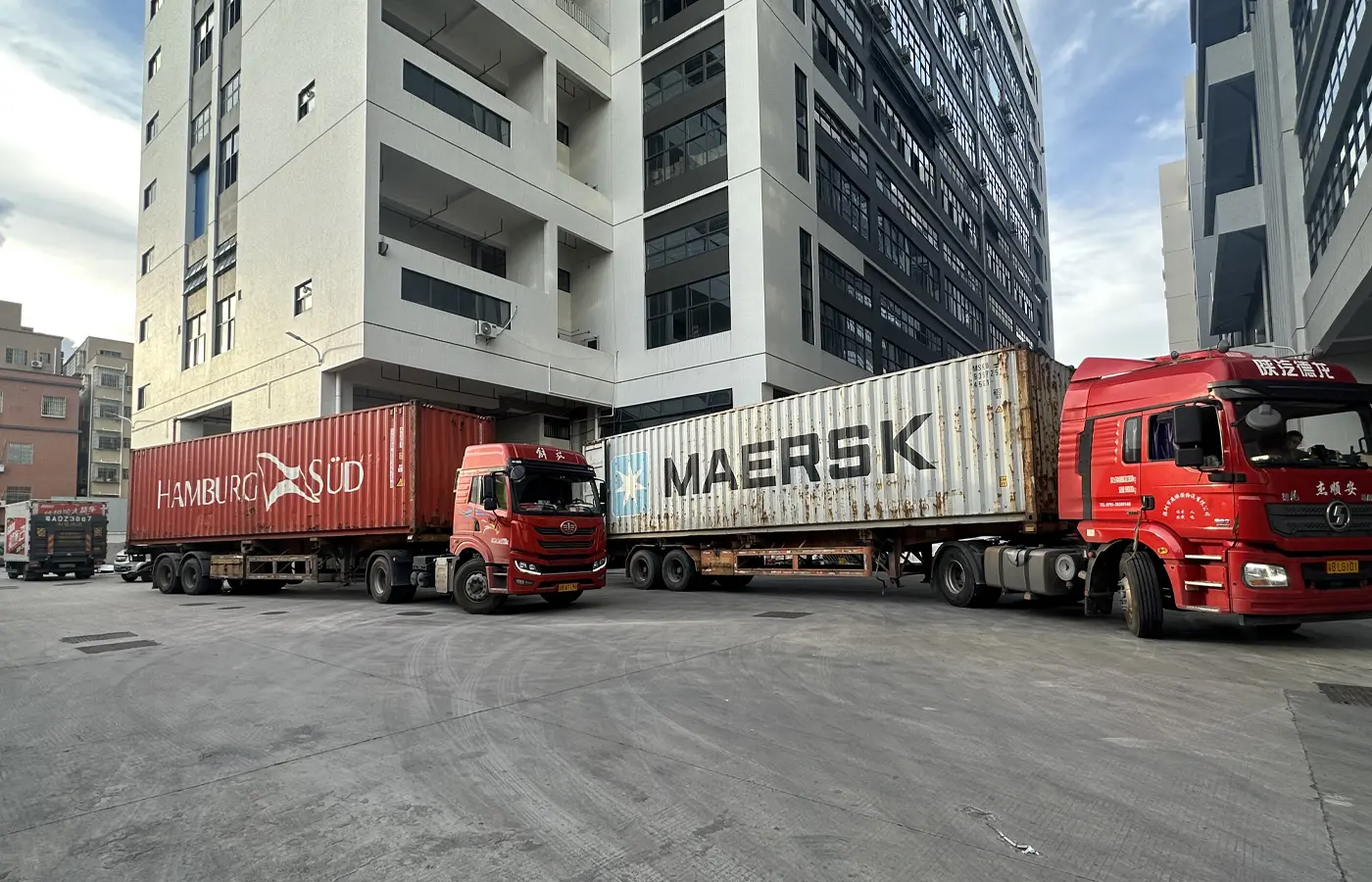 Several carrier containers staged at APEXDURA factory for global appliance shipments