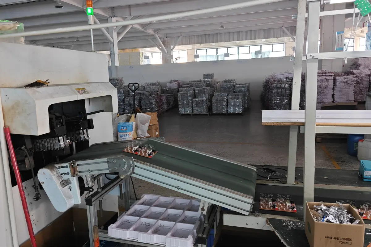 PCB soldering equipment and circuit board handling area inside APEXDURA workshop