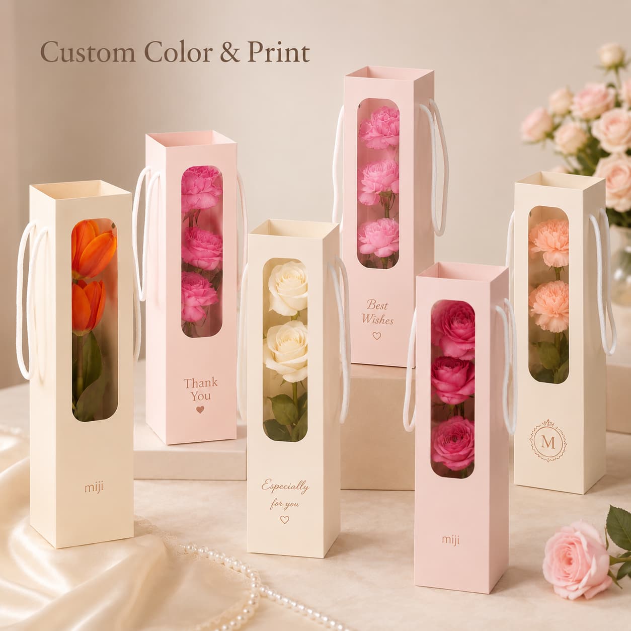 Multiple flower gift bag examples showing custom colors, wording, logo styles and floral arrangements.