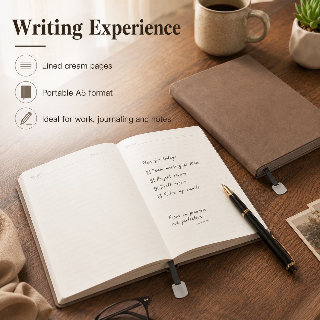 Open cream lined A5 notebook with a black and gold pen, closed coffee brown cover and organized daily planning notes on a wooden desk.