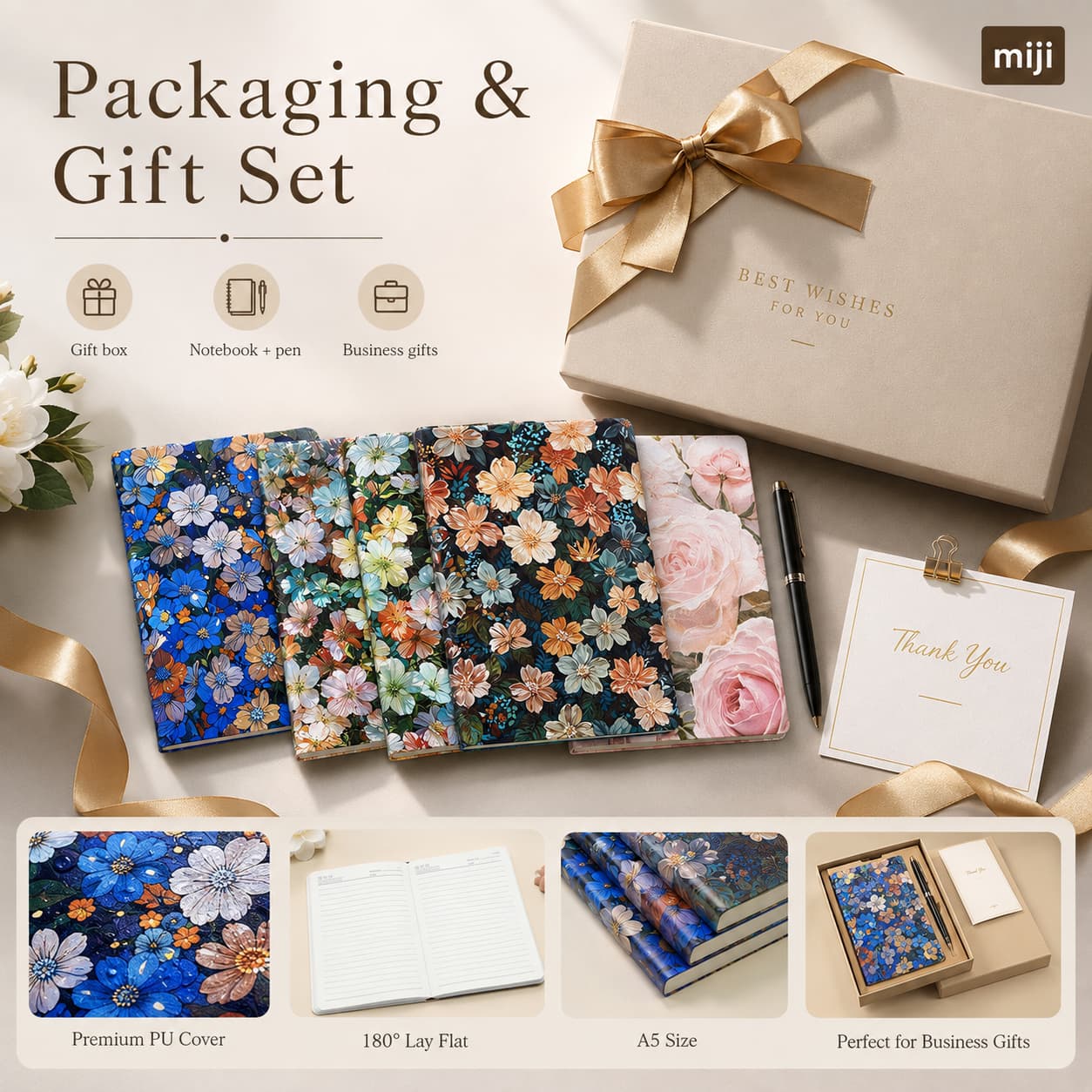 Floral notebooks shown with a pen, gift box, ribbon and card as a coordinated business gift presentation.