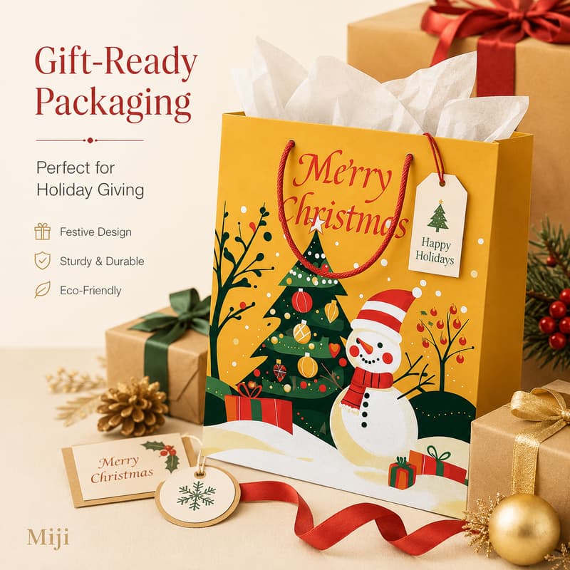 Golden Christmas paper gift bag presented with tissue paper, gift tag, cards, ribbons and wrapped gifts.