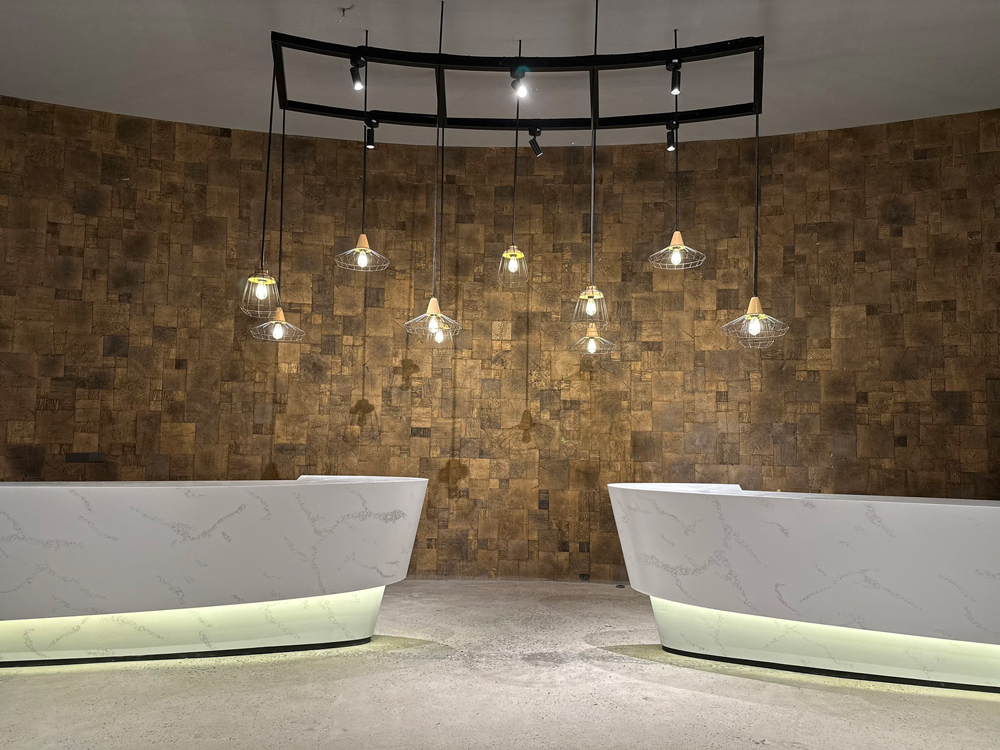 Solid Surface Crafts Curved Welcome Desks, Delivering Durability and Visual Impact
