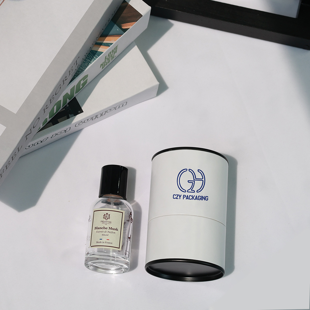 Custom Eco-Friendly Perfume Oil Paper Tube Packaging with Metal Plugs (1).jpg