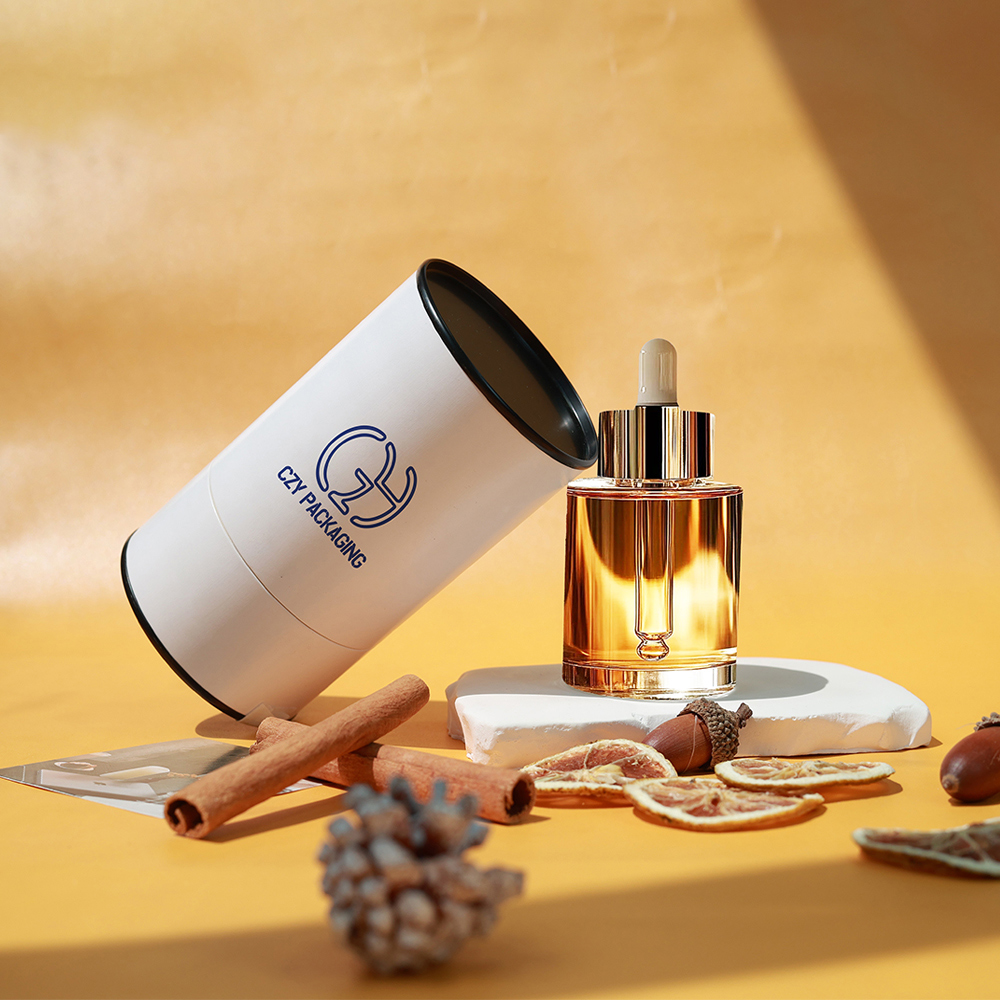Custom Eco-Friendly Perfume Oil Paper Tube Packaging with Metal Plugs (4).jpg