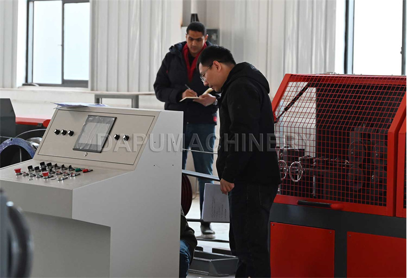 Egyptian customers inspect rebar mesh equipment at the DAPU factory.jpg