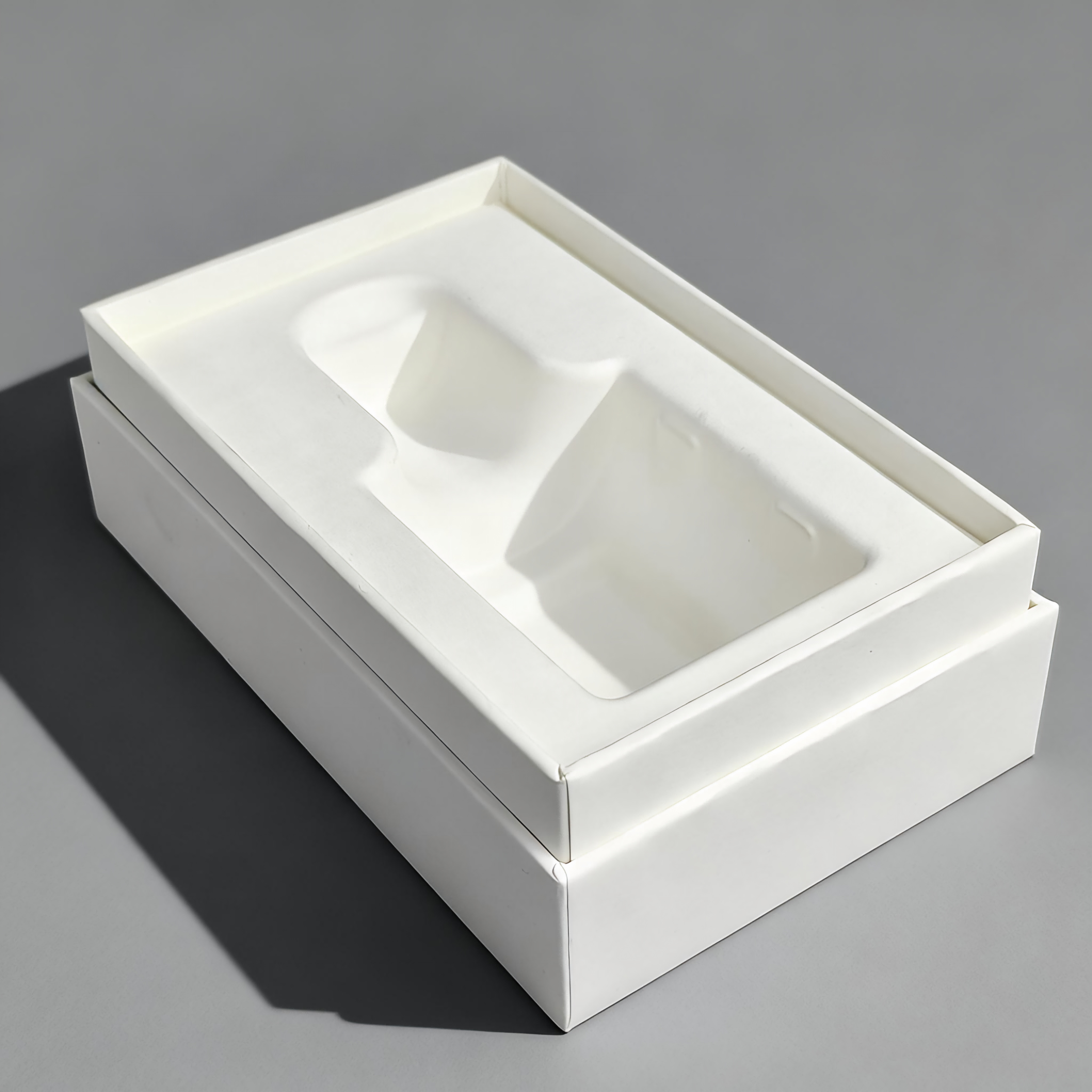 Boîte d'emballage de parfum en pulpe moulée sur mesure.png