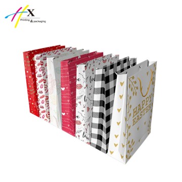 Various design paper shopping bag in custom logo 