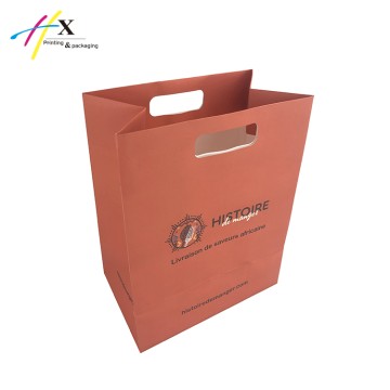 Holiday celebrating pink paper gift bag 