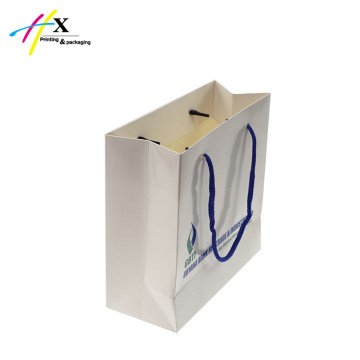 White paper shopping bag with company information printing