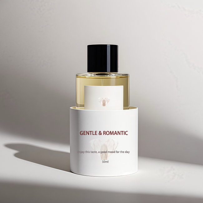 Papirnata tuba s stekleničko za parfum, ki ponuja vrhunsko izkušnjo odpakiranja in krepi podobo vaše blagovne znamke.