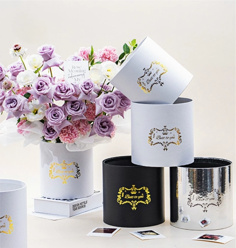 Eco-friendly Christmas gift round paper tube hug bucket, sustainable and customizable packaging.