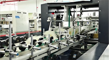 Automatic box gluer.