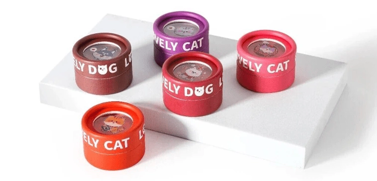 Custom-printed blush paper tube packaging with unique designs, tailored for makeup brands.