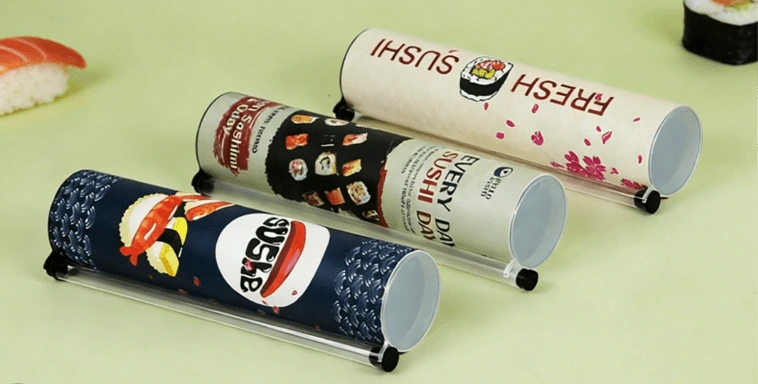 Innovative sushi push pop packaging designed for on-the-go dining and social sharing.