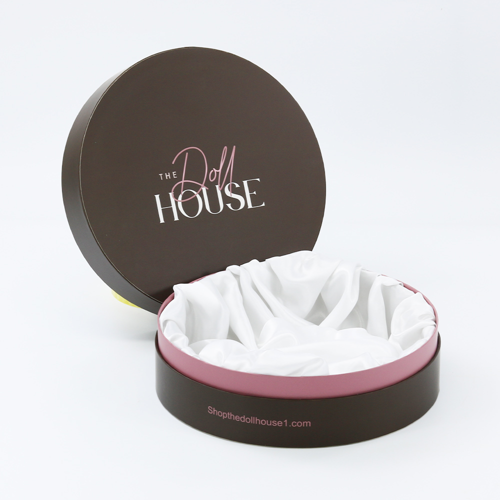 Embossed logo satin lined round shape paper package box with pink neck
