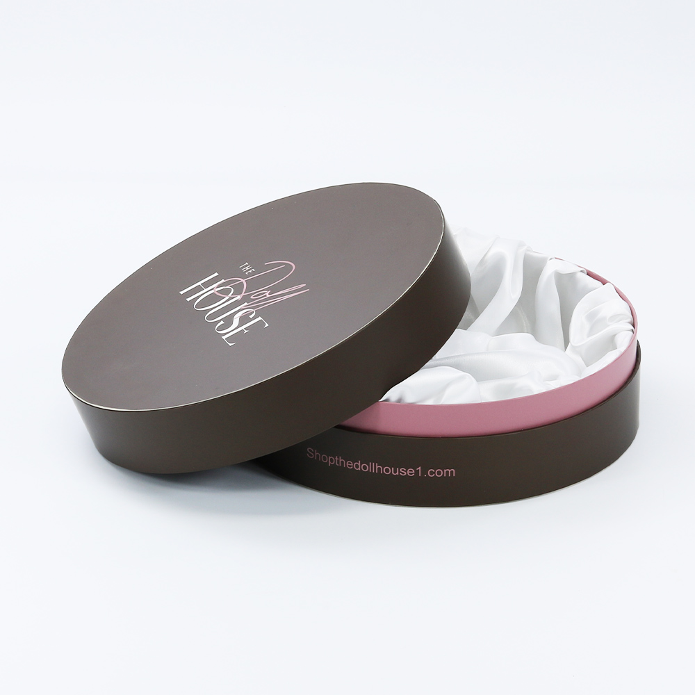 Embossed logo satin lined round shape paper package box with pink neck