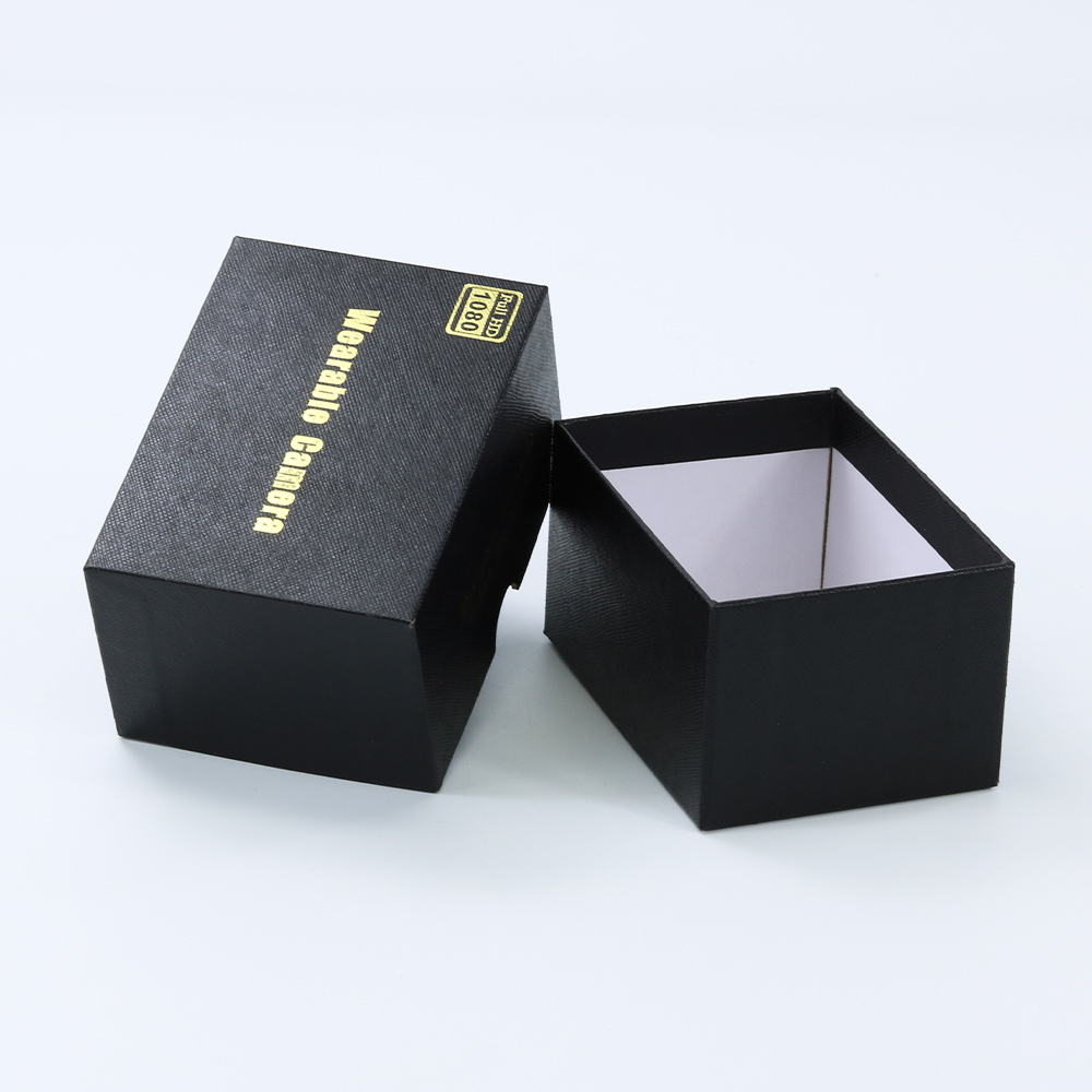 black textured cardboard paper box with gold foil logo